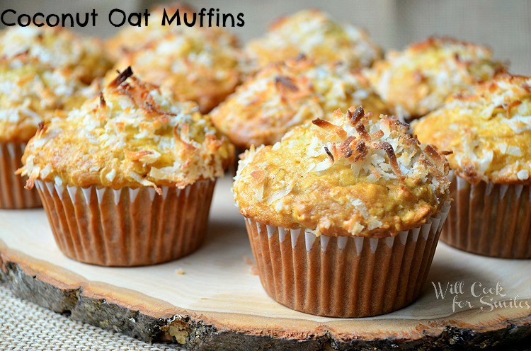 coconut oat muffins on a wood platter 