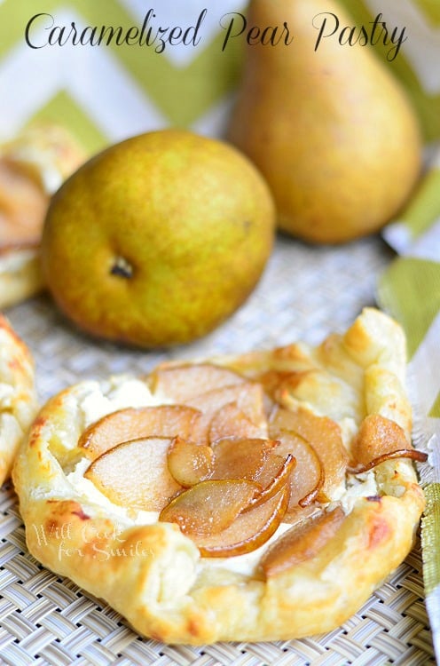 Caramelized Pear Pastry on a wicker placemat with pears at the top of it 