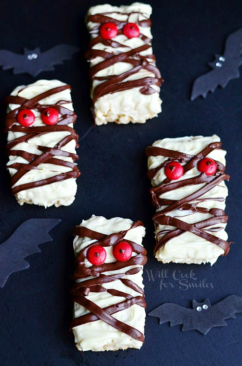 Rice Krispie Mummies with chocolate drizzle and red candy eyes 