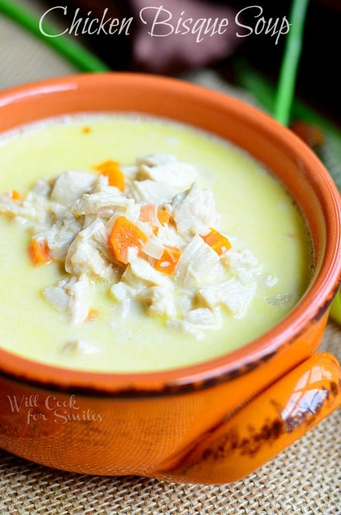 Chicken Bisque Soup in a orange bowl 