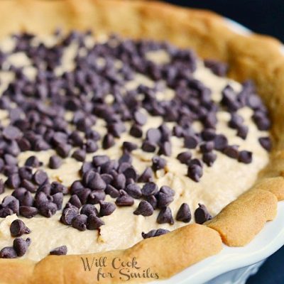 whole cake in white baking pan on black table