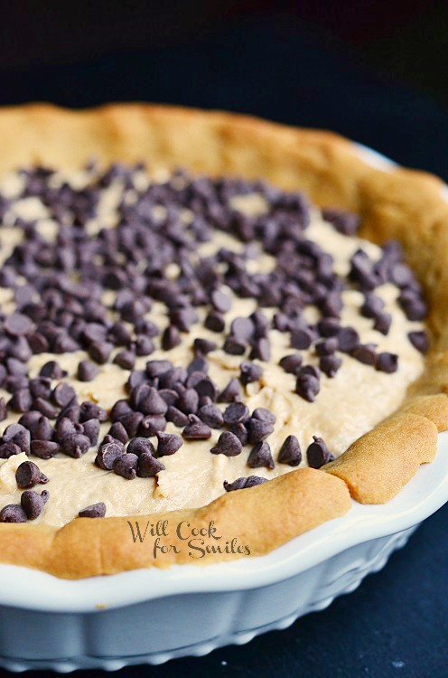 whole cake in white baking pan on black table