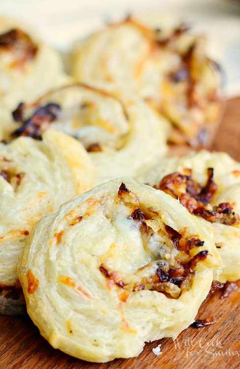 Caramelized Onion Cheesy on a wood cutting board 