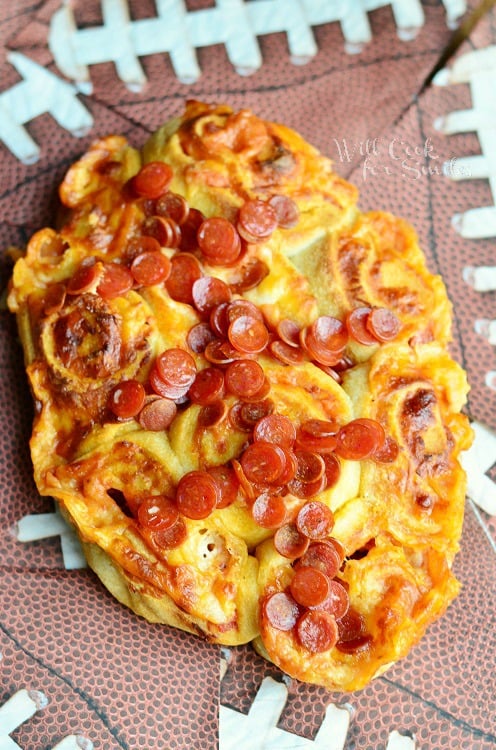 easy football pizza pinwheels on football napkins viewed from above