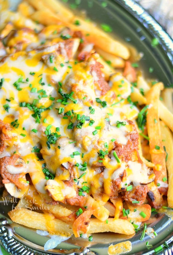  Pulled BBQ Pork Loaded Fries on a silver platter 