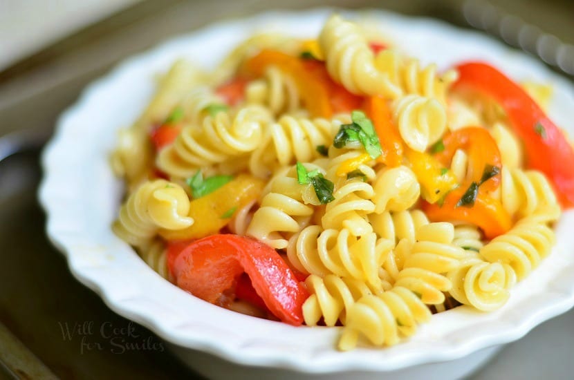 Roasted Bell Pepper and Garlic Pasta Salad in a white bowl 