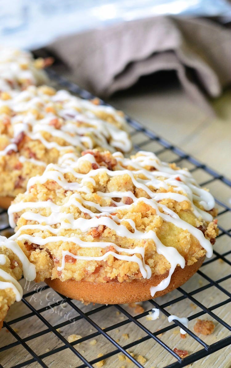 bacon crumb doughnuts on a wire rack