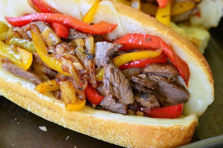 Fajita philly steak sandwich on a baking sheet tray as viewed close up and from above