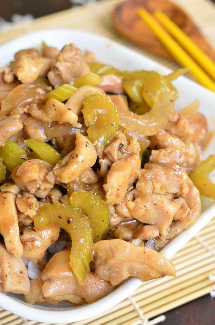 Copycat Pepper Chicken and Rice recipe. Once you try this homemade version of Panda Express Pepper Chicken, you'll never go back to take-out. Juicy, tender chicken thigh meat is sauteed with onions and celery and cooked in black pepper soy sauce. Easy and delicious 30-minutes dinner. #chicken #chickenthighs #rice #chickenandrice #easydinner