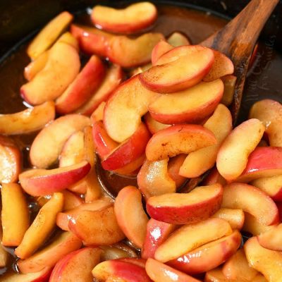 pan frying apple slices in cast iron skillet