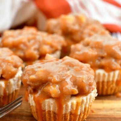 close up of caramel apple filling on mini cheesecakes