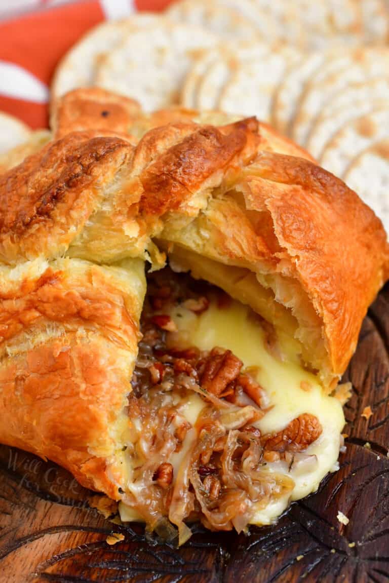 baked brie in puff pastry with pecans and caramelized onions