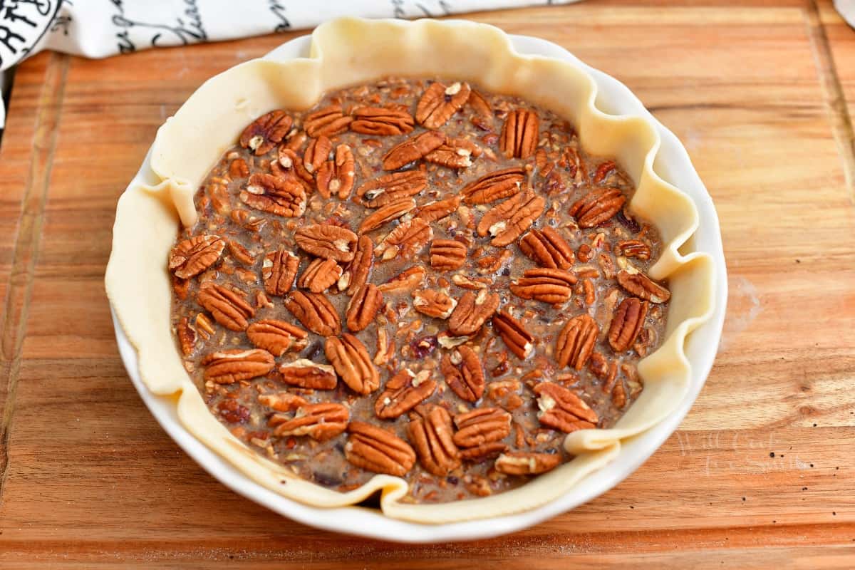 chocolate bourbon pecan pie, ready for baking