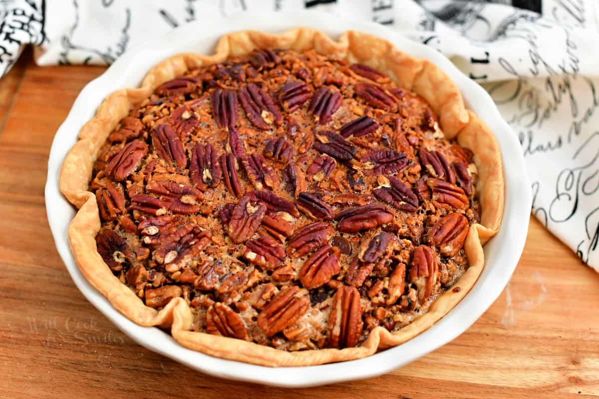 baked holiday pie topped with pecans for Thanksgiving