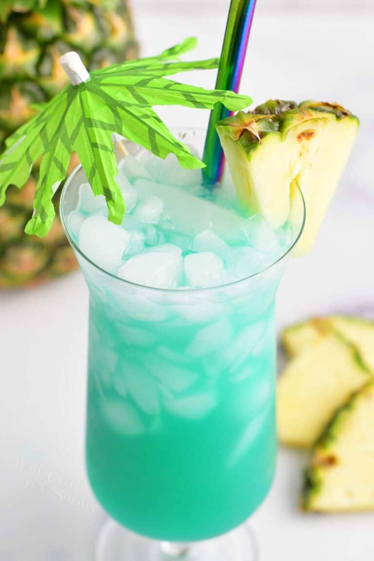 top view of blue hawaii cocktail in the glass with pineapple