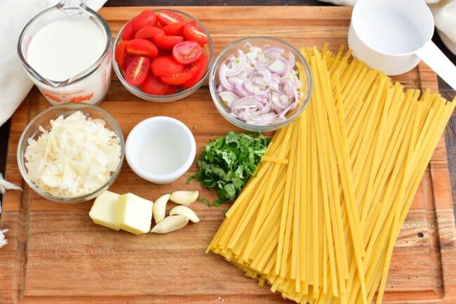 Pasta With Garlic Parmesan Cream Sauce, Tomatoes, And Basil