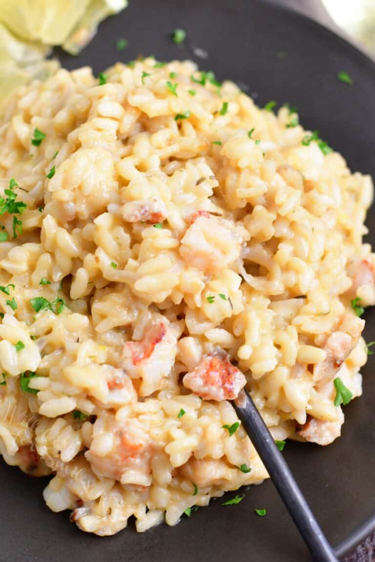 close up of scooping out some lobster risotto