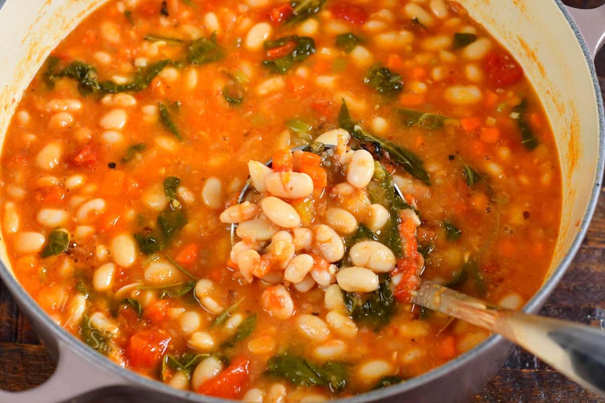 Fully cooked soup is in a pot.