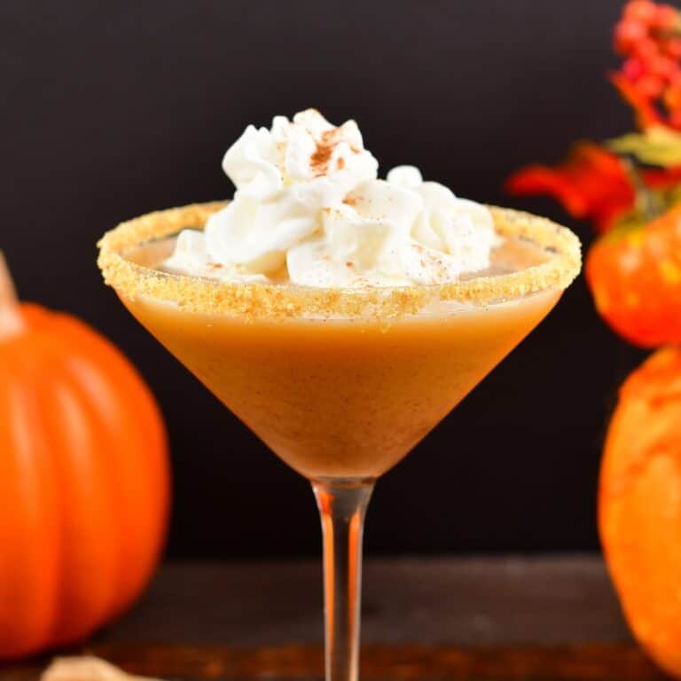 centered side view of a pumpkin martini in a martini glass