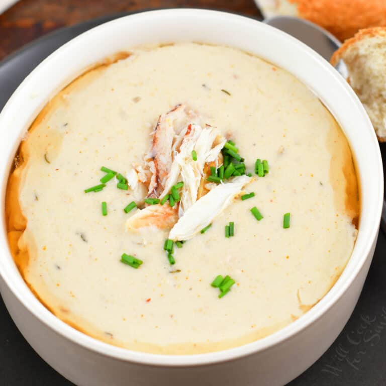 closeup image of crab soup in a bowl centered in a photo