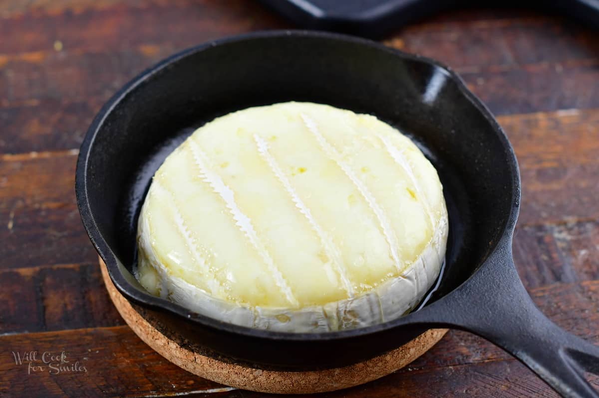 baked brie wheel in a small skillet