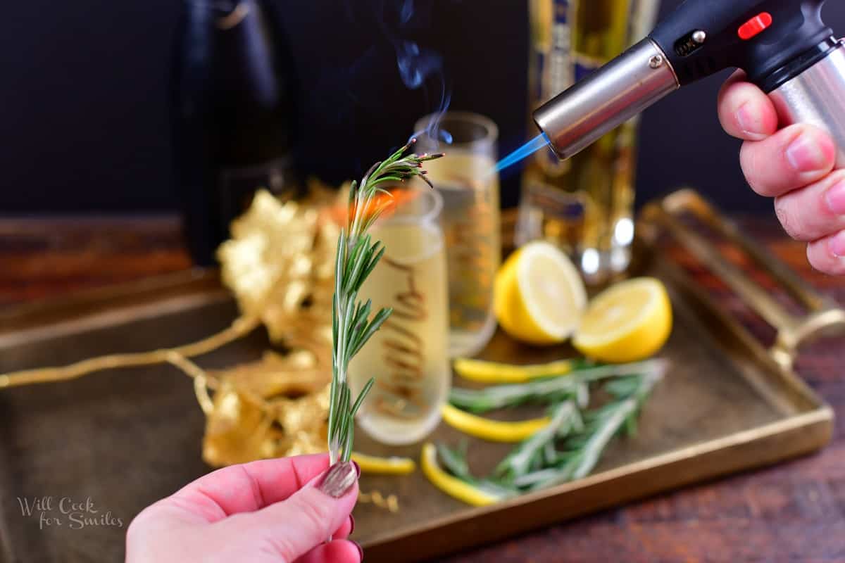 singing rosemary with a kitchen torch