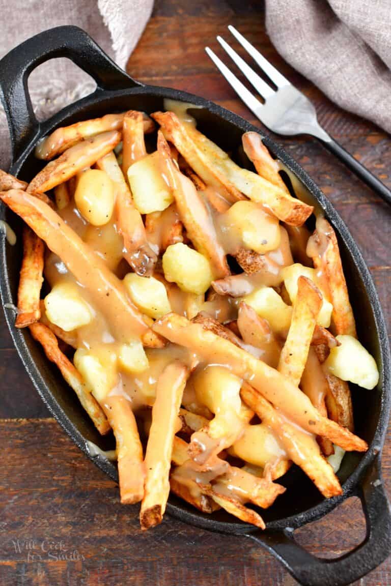 top view of dish filled with fries and cheese curds slathered in gravy