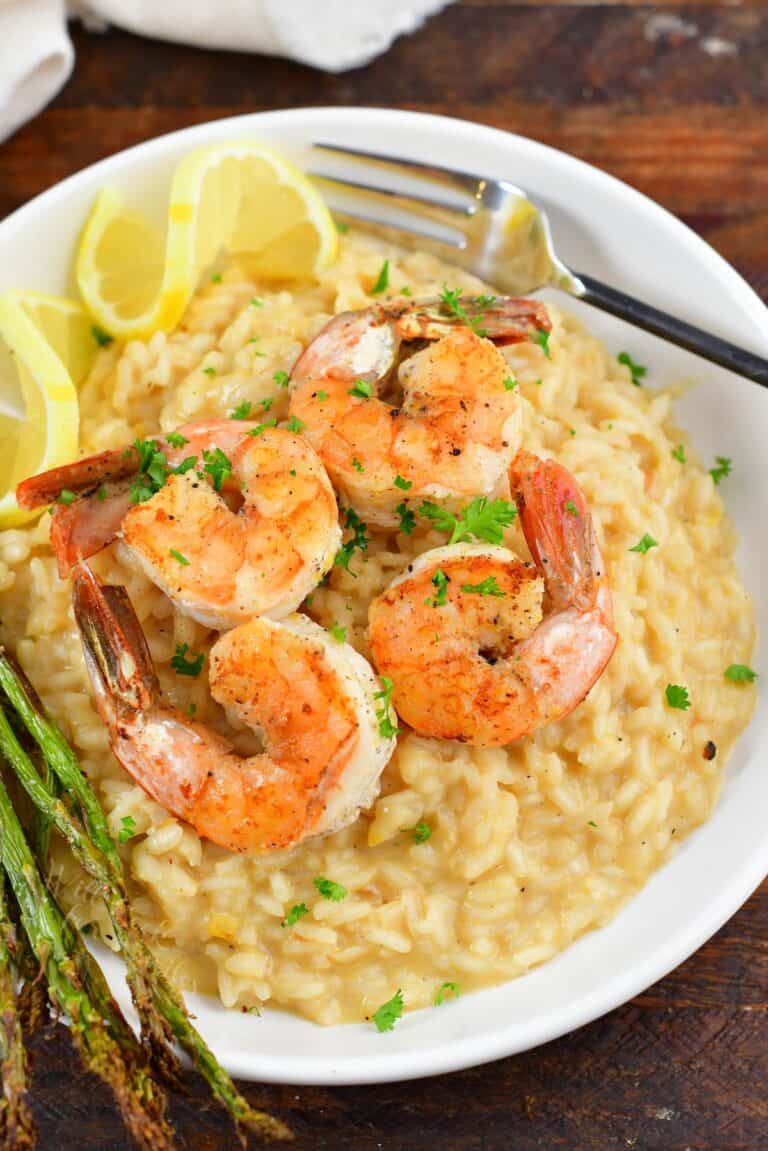 closeup of lemon risotto topped with shrimp