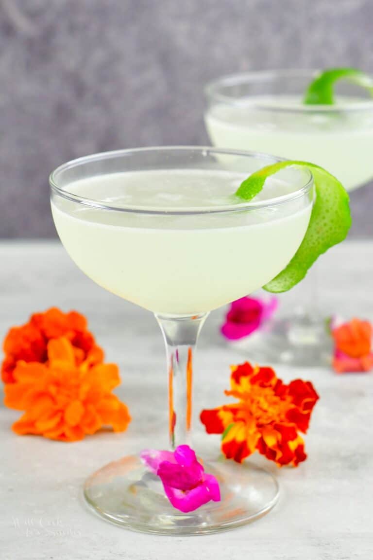 front view of the daiquiri in a tall glass with flowers