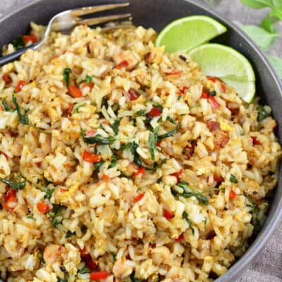 closer top view of Thai basil fried rice in a grey bowl