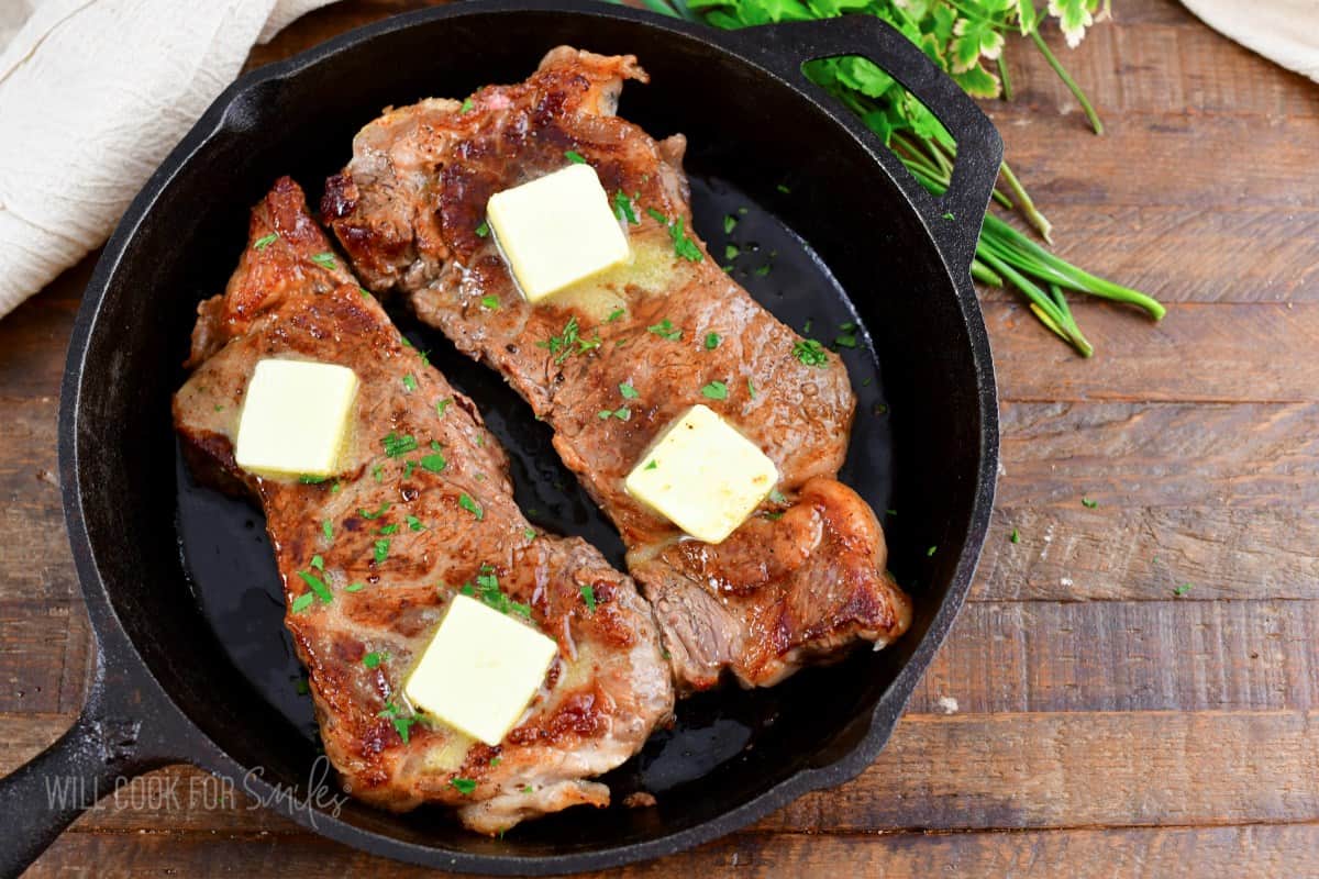 https://www.willcookforsmiles.com/wp-content/uploads/2023/03/How-To-Cook-Steak-In-The-Oven-with-butter-horizontal.jpg