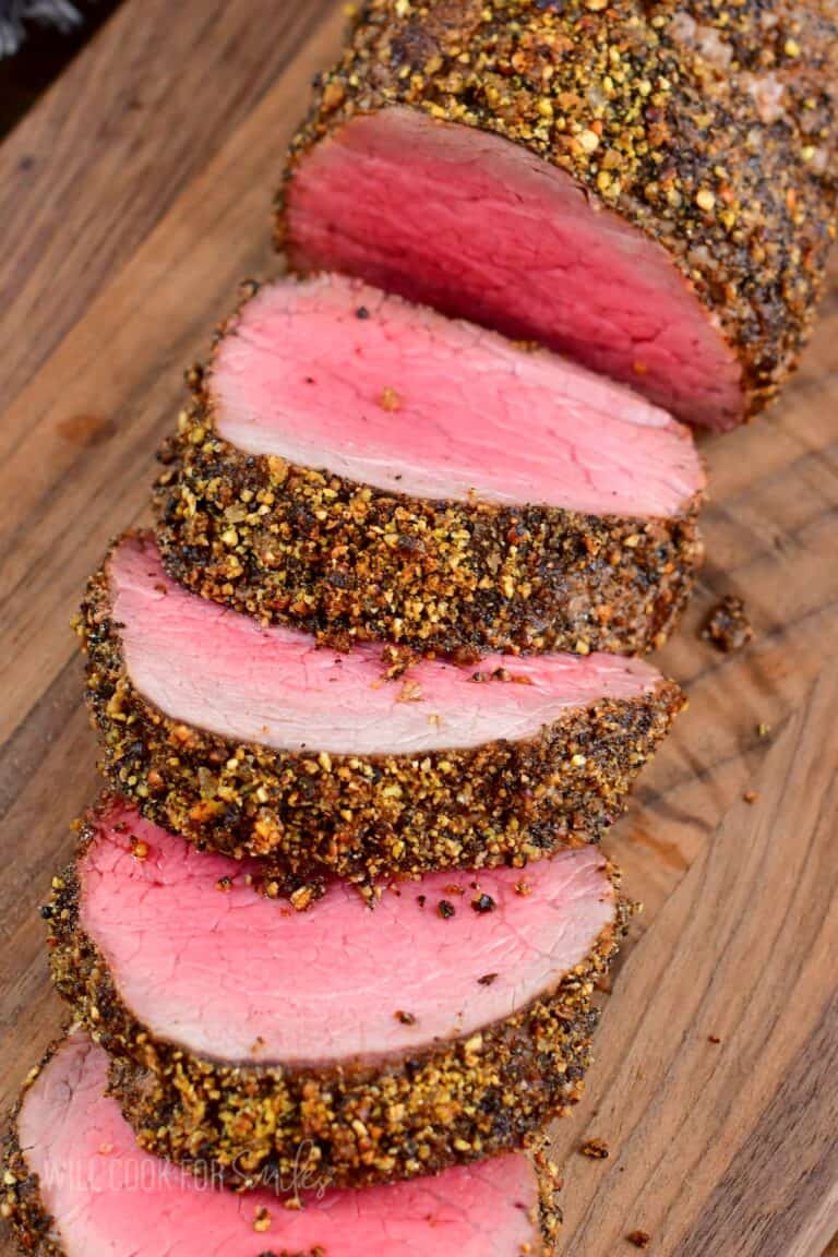 sliced beef tenderloin coated in peppercorn seasoning.