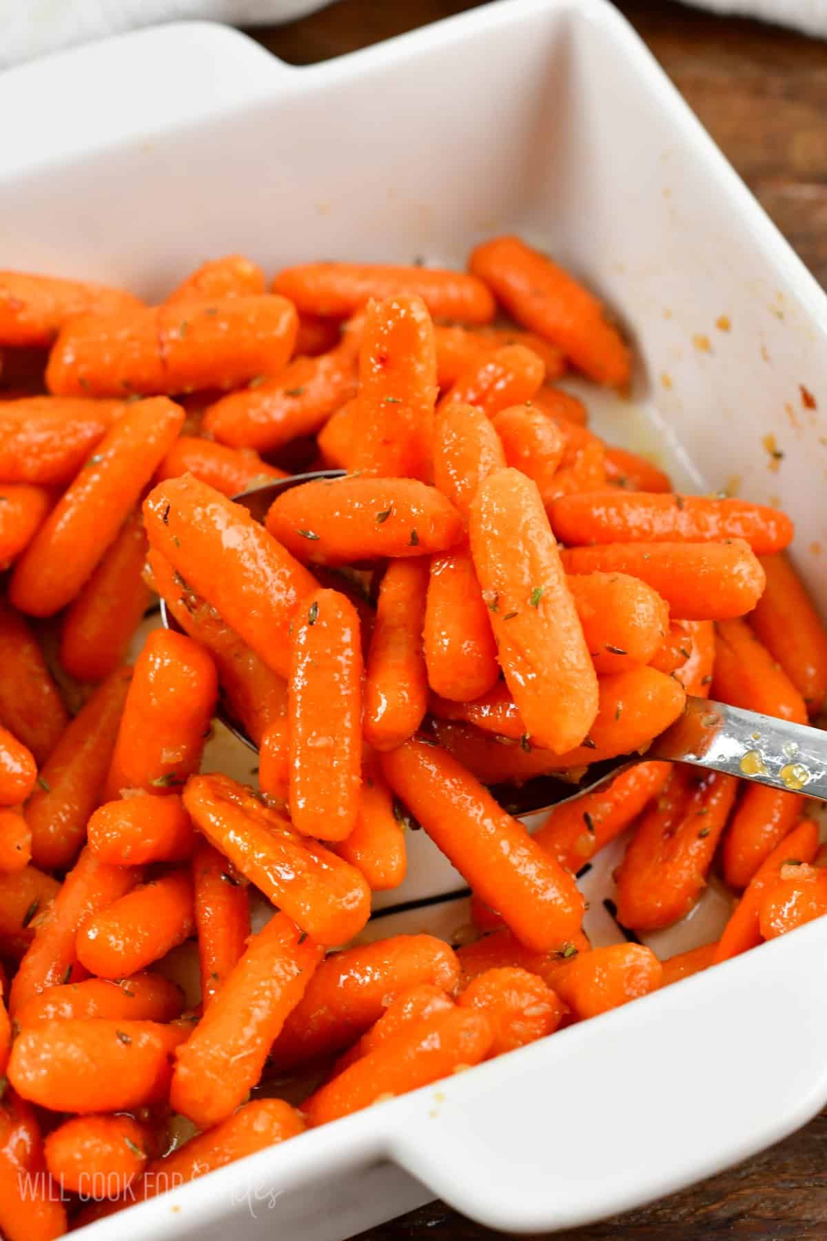 https://www.willcookforsmiles.com/wp-content/uploads/2023/12/Balsamic-roasted-carrots-scooping-2.jpg