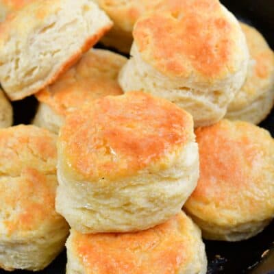 stacked biscuits in a skillet.