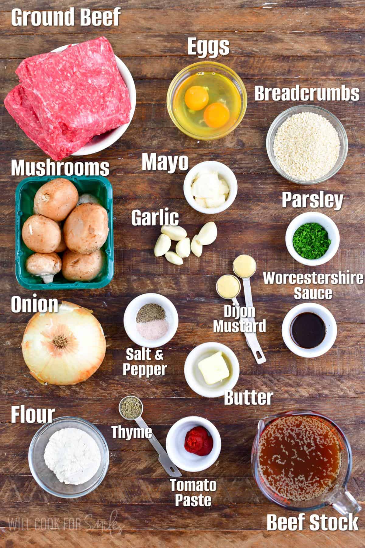 Labeled ingredients for Salisbury Steak and gravy on a wood surface.