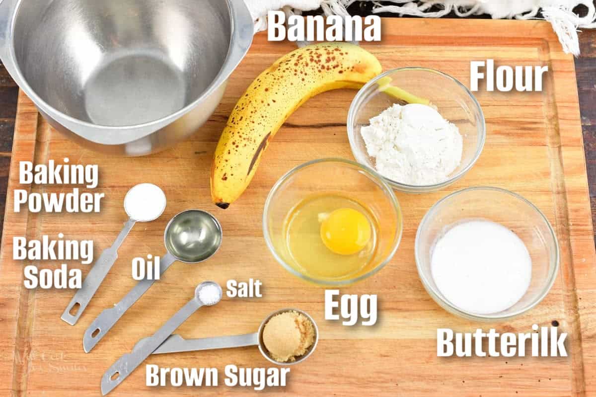 labeled ingredients to make single serving banana pancakes on a cutting board.