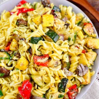 pasta salad with grilled veggies in a bowl.