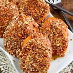 Pecan Crusted French Toast stacked side by side on a plate.