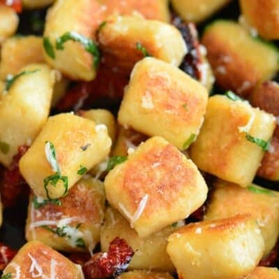 seared cauliflower gnocchi mixed with sun dried tomatoes, basil, and grated parmesan.