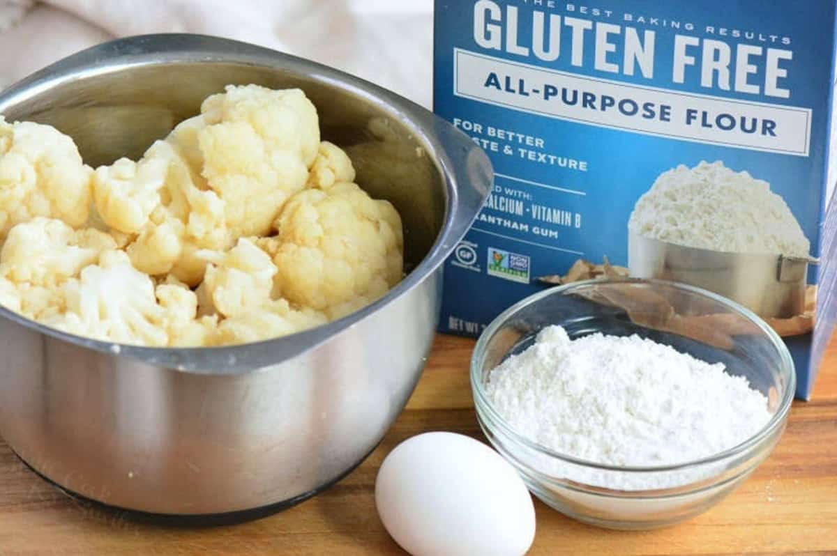 ingredients to make the cauliflower gnocchi on a cutting board.