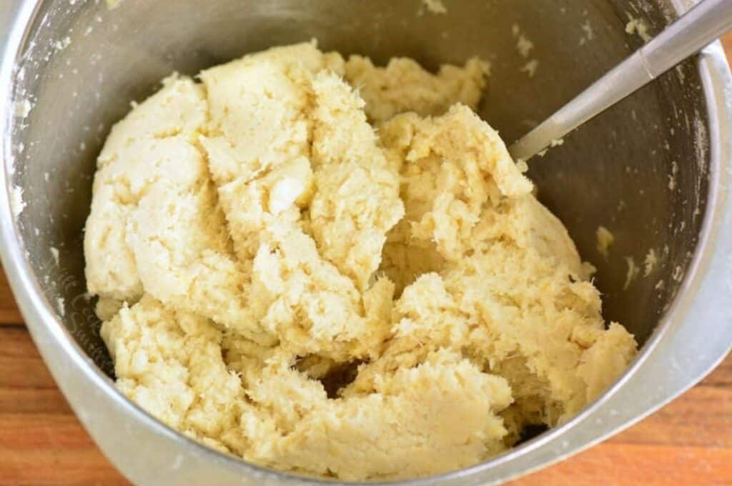 mixing the cauliflower gnocchi dough in the mixing bowl.