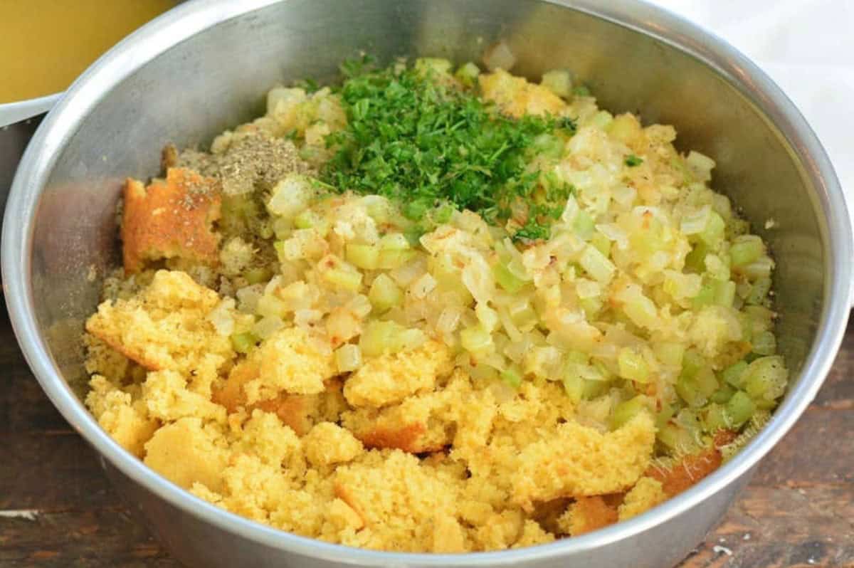 ingredients in a mixing bowl for making cornbread dressing.