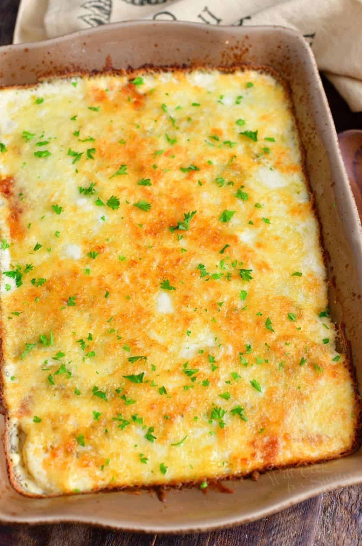 Scalloped Potatoes baked in a baking dish.