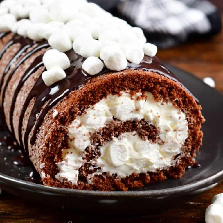 chocolate cake roll with fluffy creamy marshmallow frosting.